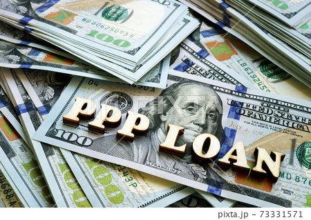 PPP loan letters on the cash. Paycheck Protection Program concept. PPP loan letters on the cash. Paycheck Protection Program concept. 73331571
