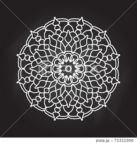 Abstract mandala on chalkboard background. 73332000