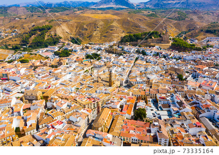 Aerial view of Antequera overlooking alcazaba and San Sebastian Church, Spain 73335164