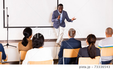 Emotional aframerican business coach giving motivational training 73336543