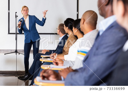 Portrait of woman speaker at business conference 73336699