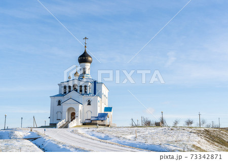 Winter Landscape with Orthodox Church against the Sky Winter Landscape with Orthodox Church against the Sky 73342871