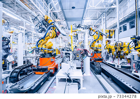 robots in a car factory robots in a car factory 73344278