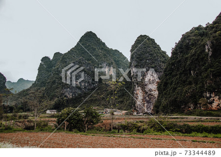 Karst mountains in Dong Van Karst Plateau Geopark in Ha giang, Vietnam 73344489