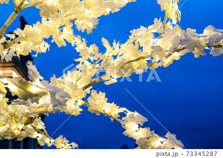 Artificial yellow maple branch - christmas street decorations in park Artificial yellow maple branch - christmas street decorations in park 73345287