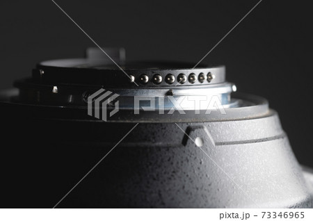 Bayonet lens close-up macro shot of an extension tube. Auto Focus Lens Contacts Bayonet lens close-up macro shot of an extension tube. Auto Focus Lens Contacts 73346965