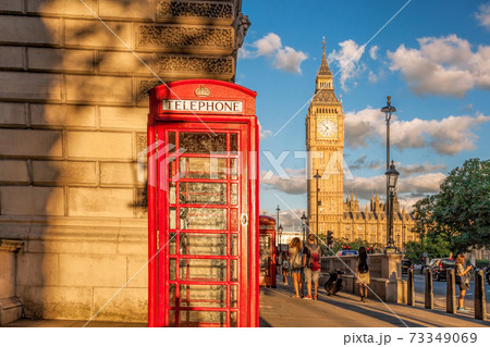 Big Ben with red phone booth in London, England, UK 73349069