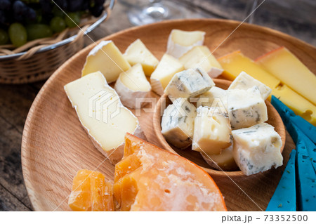 Close up image of different cheese on board 73352500