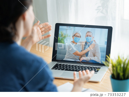 Senior couple talking with daughter Senior couple talking with daughter 73353227