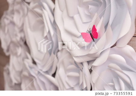 white big paper flowers on wall. handmade craft creative abstraction. 73355591