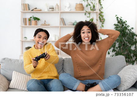 Losing in computer game and have fun together at home 73356107
