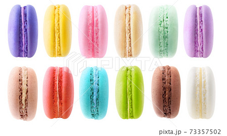 Collection of 12 multicolored macaroons on white background Collection of 12 multicolored macaroons on white background 73357502