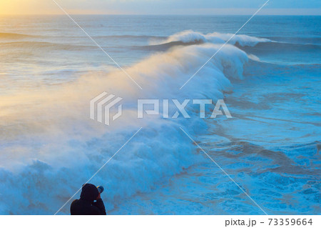 Photographer people ocean sunset wave Photographer people ocean sunset wave 73359664