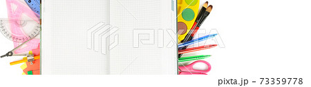 School supplies, isolated on pure white. Free space for text. Wide photo. 73359778