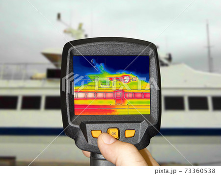 Recording Heat Loss Outside anchored luxury private motor yacht Using Infrared Thermal Camera Recording Heat Loss Outside anchored luxury private motor yacht Using Infrared Thermal Camera 73360538