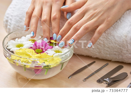 Spa treatment for female hands. 73364777