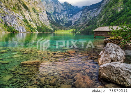 Boat dock on Obersee alpine lake,Berchtesgaden,Bavaria,Germany,Europe 73370511