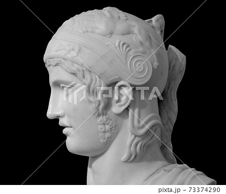 Ancient roman statue. Head and shoulders detail of the man sculpture. Antique face statue isolated on black background 73374290