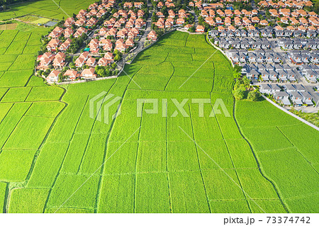 Aerial of housing subdivision or development. Aerial of housing subdivision or development. 73374742