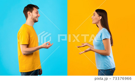 Profile portrait of couple talking to each other Profile portrait of couple talking to each other 73376966