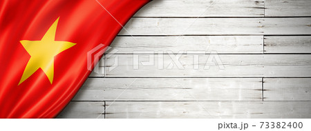 Vietnamese flag on old white wall banner 73382400