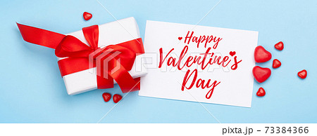 Valentines day. Gift box and heart candy sweets Valentines day. Gift box and heart candy sweets 73384366