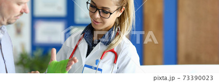 Man with bruised arm Man with bruised arm 73390023