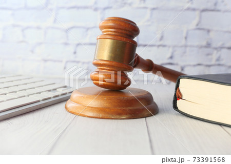 gavel and book with copy space on table gavel and book with copy space on table 73391568
