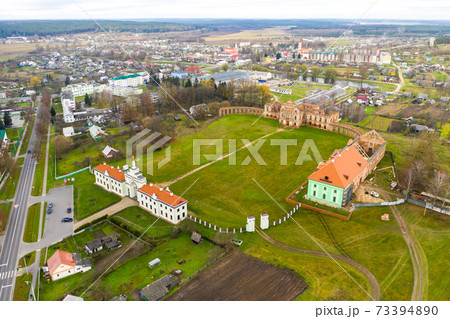 Ruzhansky Palace and the ruins of the facade of an abandoned ruined building of an ancient castle of the 18th century.Belarus Ruzhansky Palace and the ruins of the facade of an abandoned ruined building of an ancient castle of the 18th century.Belarus 73394890