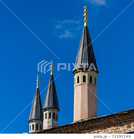 Abstract looking narrow pointed towers Abstract looking narrow pointed towers 73395249