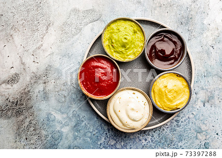 Set of different dip sauces 73397288