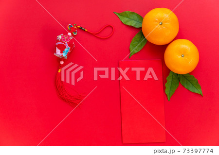 Red envelope put on red background, red envelope  and chinese lantern such as chinese new year. 73397774