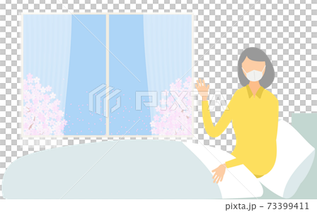 ベッドで体を起こす入院患者の女性 ベッドで体を起こす入院患者の女性 73399411
