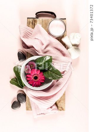 Spa setting on pink background. Flat lay Spa setting on pink background. Flat lay 73401372