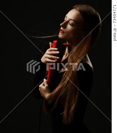 Sensual woman with silky fluttering in the wind Sensual woman with silky fluttering in the wind 73404771