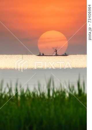 Beautiful sunrise from the lake Pakpra Beautiful sunrise from the lake Pakpra 73406964