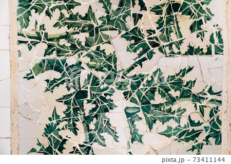 Close-up Mosaic Antonio Gaudi in the Park Guell, Barcelona 73411144