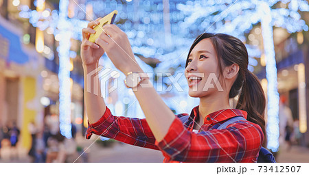 traveler take selfie in city 73412507