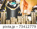 Exposure of Finance and Saving money banking concept,Hope of investor concept,Male hand putting money coin like stack growing business. background the city 73412779