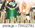 Exposure of Finance and Saving money banking concept,Hope of investor concept,Male hand putting money coin like stack growing business. background the city 73412781