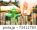 Exposure of Finance and Saving money banking concept,Hope of investor concept,Male hand putting money coin like stack growing business. background the city 73412783