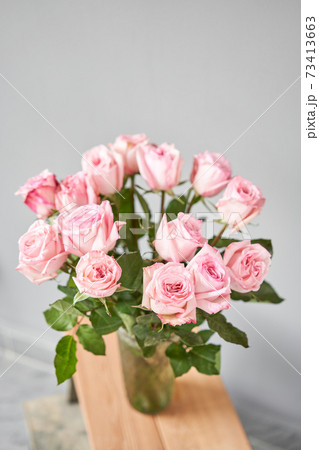 pink rose in a vase . Summer background....の写真素材 [73413663