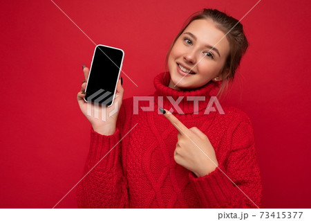 Photo of beautiful smiling young woman good looking wearing casual stylish outfit standing isolated 73415377