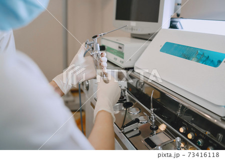 Doctor prepare to cleans tools of medical instruments 73416118