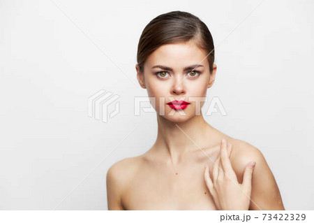 Woman with long Looking forward red lips hairstyle 73422329