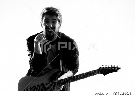 Musician with guitar rock star emotions entertainment modern performer Musician with guitar rock star emotions entertainment modern performer 73422613