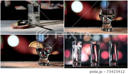 Bartender pouring up tequila into shots glasses. Bartender pouring up tequila into shots glasses. 73423412