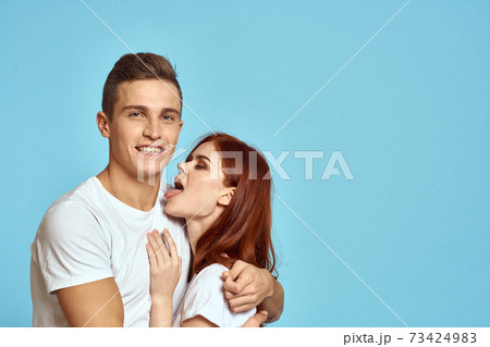 Portrait of man and woman on blue background Copy Space cropped view love family trust Portrait of man and woman on blue background Copy Space cropped view love family trust 73424983