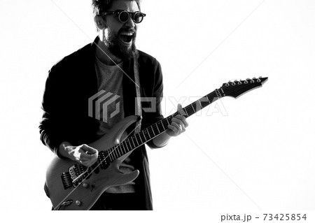 Musician with guitar rock star emotions entertainment modern performer 73425854