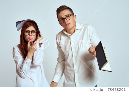 business man and woman secretary documents employees colleagues on light background cropped view 73428201